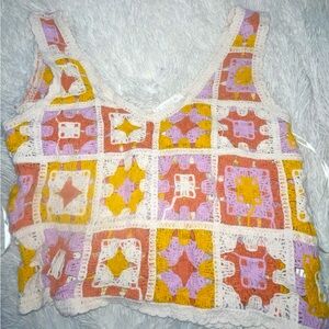 Colorful knitted vest [violet, coral, yellow, white.]